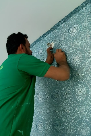 Skilled wallpaper fixing team